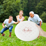 Markenname für Rosengold Wham-O Frisbee<br><div class="desc">Stylish white background and rose gold colored text. Personalize and add your monogram initials and name. Your monogram initials as background pattern.</div>