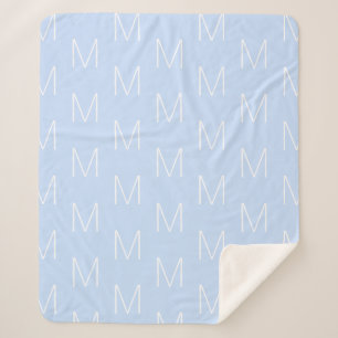 Markieren Sie den Anfangsbuchstaben des Monogramms Sherpadecke