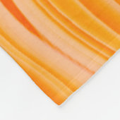 Marmorfarbe farbig. Orangefarbenes Marmormuster Fleecedecke (Ecke)