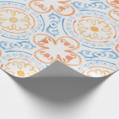 marokkanischer Fliesenboden in blau-orangefarbenem Geschenkpapier (Ecke)