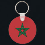 Marokko Schlüsselanhänger<br><div class="desc">Flagge Marokkos. Die Flagge Marokkos (Arabisch: ع م ا ل غ ل مرب; Berber: Acenyal n Umerruk) ist aus einem roten Feld mit einem schwarz-grenzenlosen grünen Pentagramm. Rot hat in Marokko eine beachtliche historische Bedeutung und verkündet den Abstieg der königlichen Alaouitenfamilie vom Propheten Mohammed über Fatima, die Ehefrau von Ali,...</div>