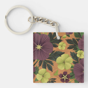 Maroon und Gelbe Blumen auf orangefarbenem Hinterg Schlüsselanhänger