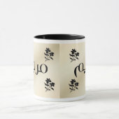 Maryam in der arabischen schwarzen u. beige Tasse (Zentrum)