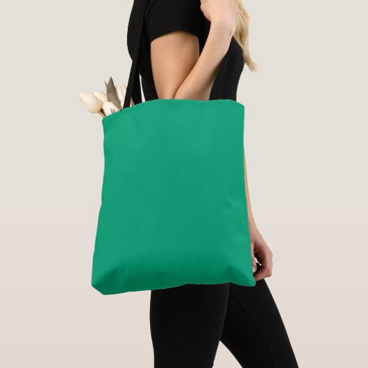 Massiver Türkishintergrund mit einer glatten Textu Tasche (Von Nahem)