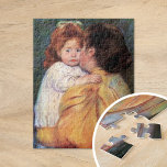 Maternal Kiss | Mary Cassatt Jigsaw Puzzle<br><div class="desc">Maternal Kiss (1896) von der amerikanischen Impressionistin Mary Cassatt. Das Original pastellfarbene Portrait zeigt eine Mutter,  die ihre junge Tochter hält und ihr einen Kuss auf die Wange gibt. Verwenden Sie die Entwurfstools,  um einen benutzerdefinierten Text hinzuzufügen oder das Bild zu personalisieren.</div>