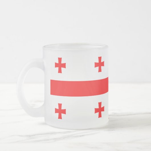 Mattierte kleine Tasse aus Glas mit georgischer Fl (Links)