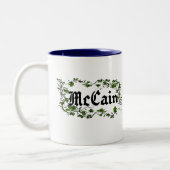 McCain kriechende Efeu-keltische irische Tasse (Links)