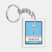 Medizinischer wachsamer Schlüsselanhänger hellblau (Vorderseite links)