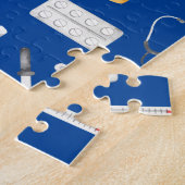 Medizinstudium des kleinen jungen Arztes mit dem N Puzzle (Seite)