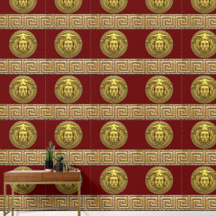 Medusa und griechischer Schlüssel in Gold auf Burg Tapete