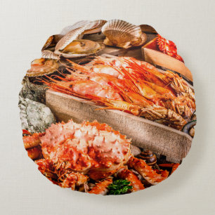Meeresfrüchte-Kochplatte zum Abendessen am Meeresu Rundes Kissen