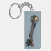 Meeresotter, der im Ozean zurückschweben Schlüsselanhänger (Vorderseite links)