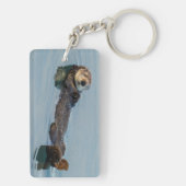 Meeresotter, der im Ozean zurückschweben Schlüsselanhänger (Rückseite)