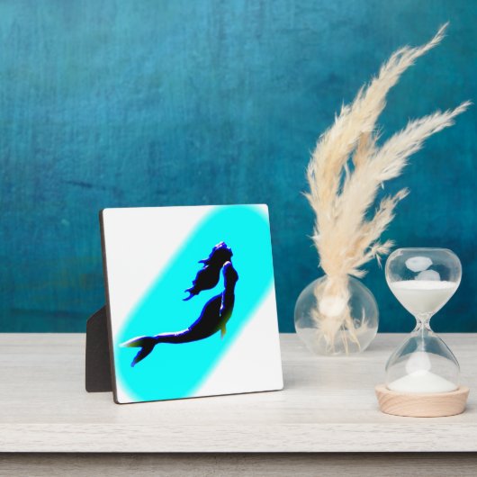 Meerjungfrau steigt fotoplatte (InSitu)