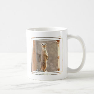 Meerkat an der Aufmerksamkeits-Kaffee-Tasse Kaffeetasse