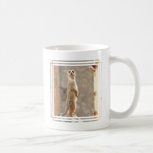 Meerkat an der Aufmerksamkeits-Kaffee-Tasse Kaffeetasse (Rechts)