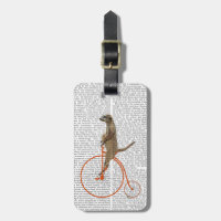 Meerkat auf Orange Penny Farthing