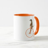 Meerkat auf Orange Penny Farthing Tasse (VorderseiteRechts)