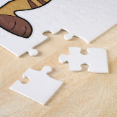 Meerkat bei Reading a Newspapier Puzzle (Seite)