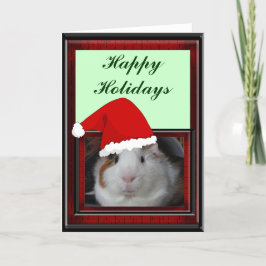 Meerschweinchen in der Weihnachtsmannmütze Feiertagskarte