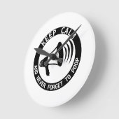 Megaphon: Behalt ruhig und vergiss nie. Runde Wanduhr (Winkel)