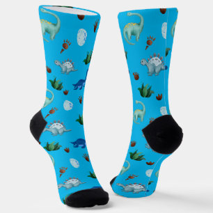 Mehrere Dinosaurier-Arten im türkisfarbenen Hinter Socken