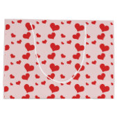 Mehrere rote Herzen auf einer niedlichen Geschenkt Große Geschenktüte (Rückseite)