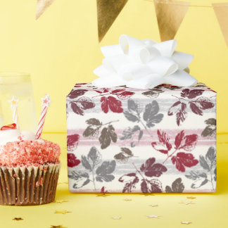 Mehrfarbige Blätter auf einem gestreiften Hintergr Geschenkpapier