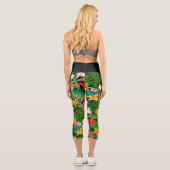 Mehrfarbige Blume & Palm-Blätter auf schwarz Capri Leggings (Rückseite)