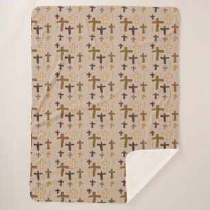 Mehrfarbige christliche Kreuze auf Beige Sherpadecke