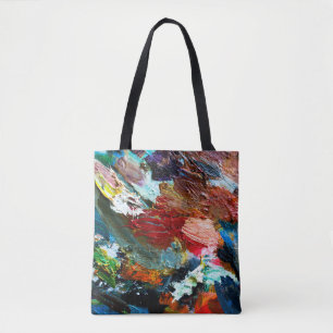 mehrfarbige Linien der Ölfarbe auf den Künstlern Tasche