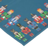 Mehrfarbige Nutcracker auf Bluegreen-Hintergrund Tischdecke (Schrägansicht)