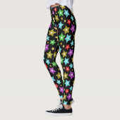 Mehrfarbige und schimmernde Goldstars auf schwarz Leggings (Links)