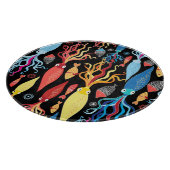 mehrfarbiger Tintenfisch Schwarzer Hintergrund Schneidebrett (Ecke)