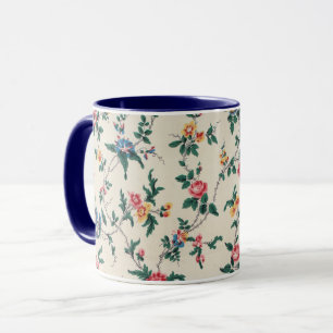 Mehrfarbiges Blumenmuster mit marineblauer Umrandu Tasse