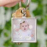 Mein Baby Foto Custom Schlüsselanhänger<br><div class="desc">Ihr Lieblings-Baby-Foto auf einem Schlüsselanhänger! Laden Sie Ihr eigenes Bild hoch,  um Ihren Schlüsselanhänger für sich selbst zu kreieren oder als Geschenk an Familie,  Freunde,  Eltern und Großeltern! Das Wort Liebe in einem Karo Skript wird über Ihrem Foto angezeigt.</div>