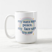 Meine Aura sagt Frieden, mein Gesicht sagt, versuc Kaffeetasse (Links)