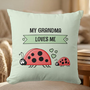 Meine Oma liebt mich Marienkäfer grün Baby Kissen