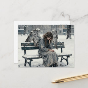Melancholischer Engel im schneebedeckten Park-Tusc Postkarte