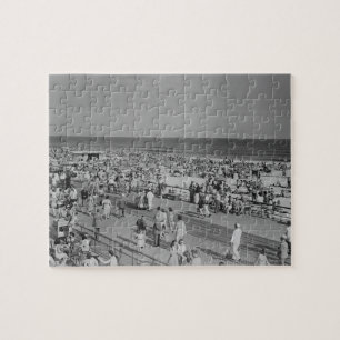 Menge am Strand Puzzle