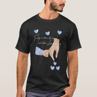 Mens neuer Vater eines Jungen, der die Hände mit e T-Shirt
