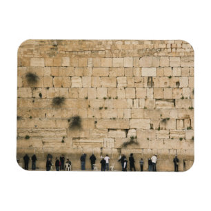 Menschen beten an der Wendewand Magnet