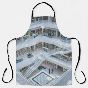 MENSCHEN, DIE INNERHALB DER BIBLIOTHEK GEHEN SCHÜRZE