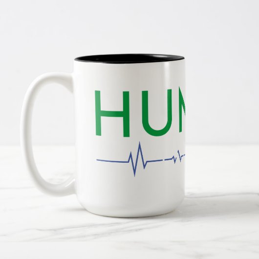 Menschenrechtspflege Zweifarbige Tasse (Links)