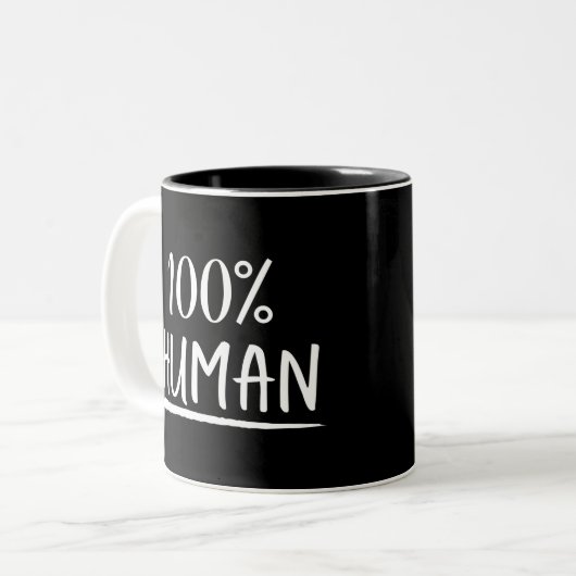 Menschheit 100% Menschlichkeit Zweifarbige Tasse (Vorderseite Links)