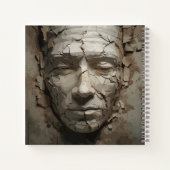 Menschliches Gesicht, das vom alten Plaster herrüh Notizblock (Rückseite)