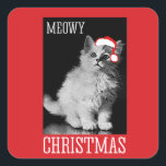 Meowy Christmas Quadratischer Aufkleber<br><div class="desc">Happy Holigays! Shopping Holiday Spaß,  LGBTQ  Designs und lustige Weihnachtsgeschenke aus dem LGBTShirts.com Shop für jedermann und über 10.000 mehr LGBTQ  Geschenke,  Holiday Spaß,  Equality,  Slang & Culture Designs. Die einzigartigste Gay,  Lesbian Bi,  Trans,  Que und Intersexed Apparel im Web. KAUFEN SIE MEHR LGBTQ -Designs und -Geschenke unter: http://www.LgbtShirts.com</div>