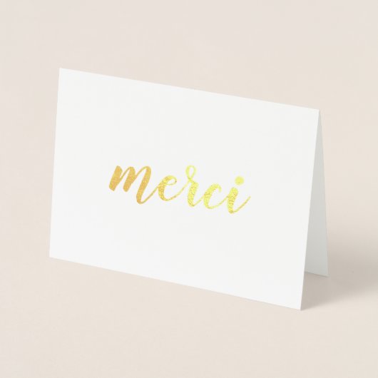 Merci Französisch Danke Brushstroke Script Gold Folienkarte (Vorderseite)