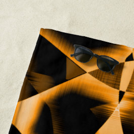 Merkwürdiges Gewirr verbrannter Bänder, orange und Strandtuch