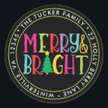 Merry & Bright Colorful Christmas Address Label Runder Aufkleber<br><div class="desc">This unique Christmas design features the expression "Merry & Bright" in colorful letters accented with a Christmas tree on a black background! This design is based on our "Merry & Bright" photo Christmas card. Perfect for party favors for your child's classroom Christmas party or for a holiday party or cookie...</div>